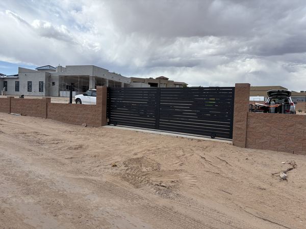 Sliding gate in a block wall, wider view
